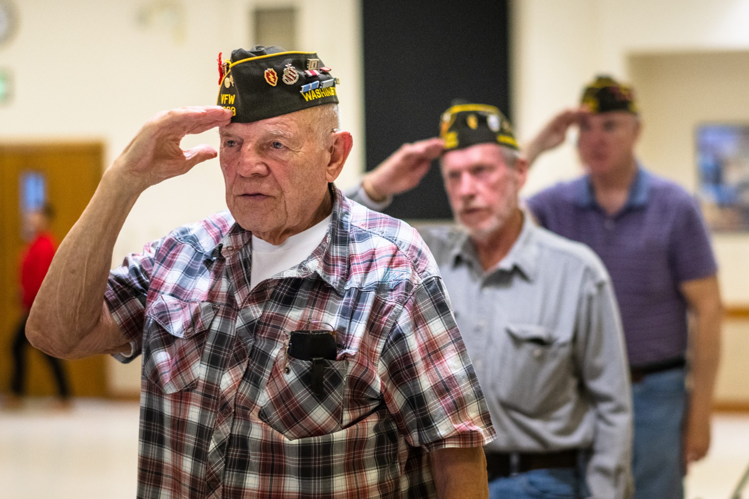 Veterans gathered around tables at a monthly organization meeting